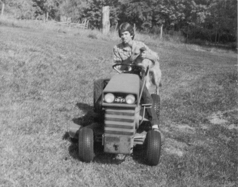 JMC 1977 - 2.JPG - Cutting the grass with the dog prior to senior year in high school Lousiville, KY 1977